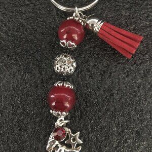 Capricorn Zodiac Keychain with Red Beads & Tassel